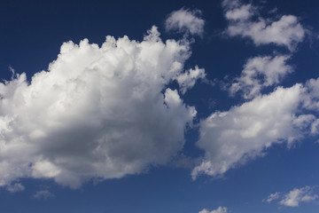 Naklejka na ściany i meble Clouds against a blue sky