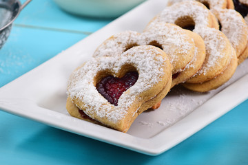 Heart shaped cookie filled with strawberry jam
