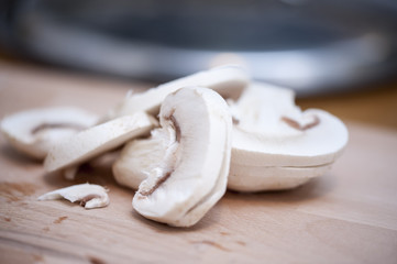 Close-up of mushrooms on cutting board.