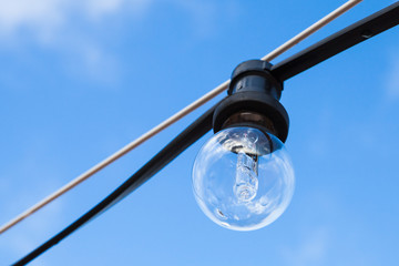 Obraz premium Incandescent lamp is off, closeup photo