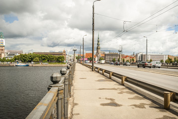 Fototapeta na wymiar Cityscape of Riga with bridge over river