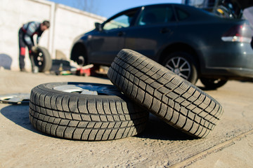 Replacement wheels of the car in the spring, car tire © smspsy