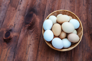 Farm natural organic eggs on a wooden background