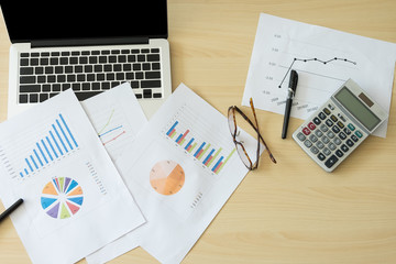 Top view of bussiness and financial report and office equiment. with copy space