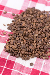 Coffee beans background on the kitchen table cloth