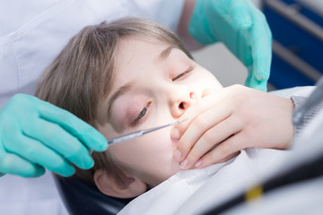 Naklejka premium Scared of his first dental checkup