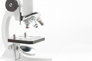 Detail of a microscope on a white background 