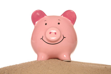 piggy bank on sand