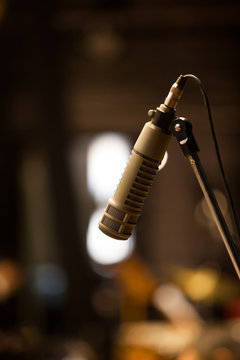 Microphone on a rack closeup in dark colors