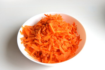 Plate with grated carrots.