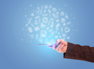 Hand with phone and drawn office icons