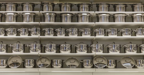 Pots on the shelves in the store sold