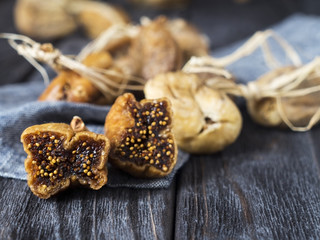 dried figs on wooden table for healthy breakfast