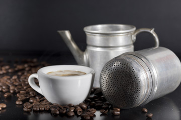 white cup with old Neapolitan coffee