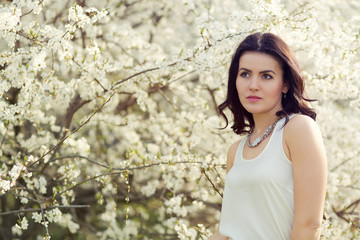 Beautiful woman in a spring park