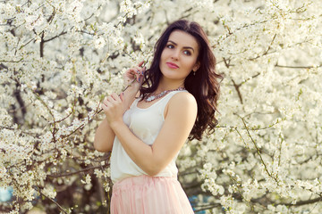 Beautiful woman in a spring park