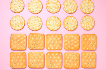 Pattern of cookies. Cookies on a pink background