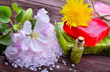 spa. Flowers with sea salt. soap with fruit on a wooden backgrou