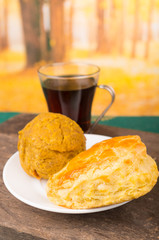 Delicious ecuadorian breakfast, empanada y bolon with dark coffee