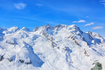 Fototapeta na wymiar Snow Mountain with Blue Sky, Swiss Alps