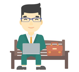 Man working on laptop.