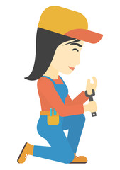 Repairer holding spanner.