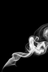 Abstract gray smoke from the incense sticks.