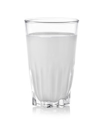 fresh milk in the glass on white background