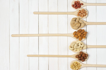 Assorted nuts in spoons