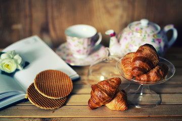 tea cup croissant book