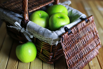 green apple in a basket