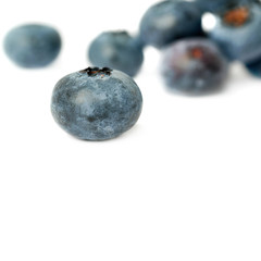 Pile of Bilberry or blueberry over isolated white background