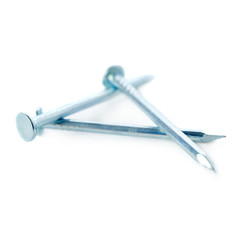 Pail of Metal nails isolated over the white background