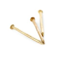Pail of Metal nails isolated over the white background