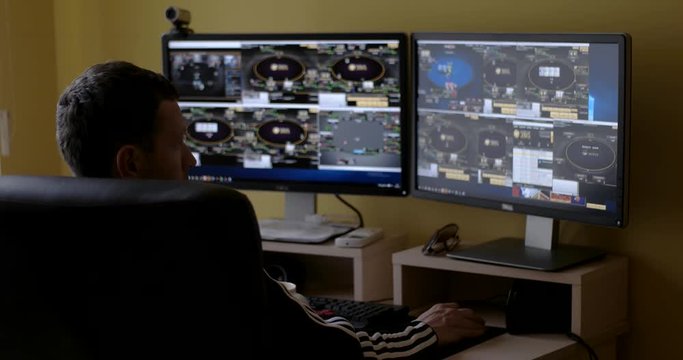 Man Playing Online Poker, Multitabling. Time-Lapse