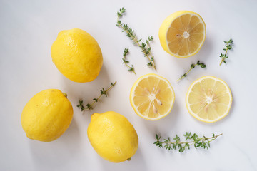 lemon and thyme on white background