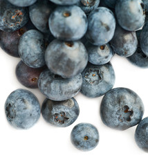 Bilberry or blueberry over isolated white background