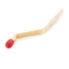 Broken Wooden match isolated over the white background