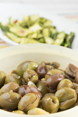 green olives seasoned with oil and fennel seeds