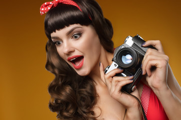 pin-up girl with retro camera
