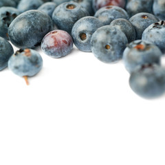 Pile of Bilberry or blueberry over isolated white background