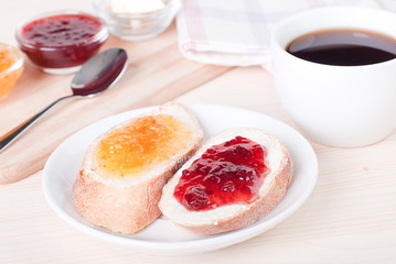 Obraz na płótnie Canvas two sandwiches with jam