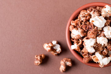 popcorn with caramel in a bowl