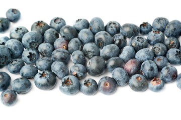 Bilberry or blueberry over isolated white background