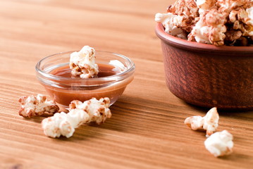 bowl of caramel popcorn on the table
