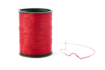 Spool of thread isolated over the white background
