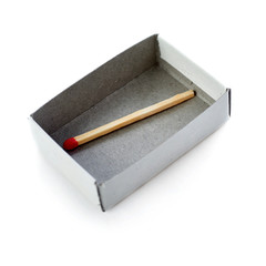 One Wooden match in box  isolated over the white background