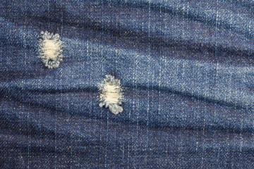 Blue torn denim jeans texture, Jeans background.