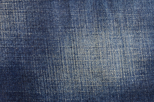 Texture of blue jeans background.