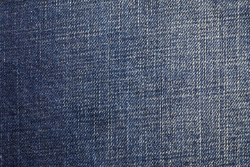 Naklejka premium Texture of blue jeans background.
